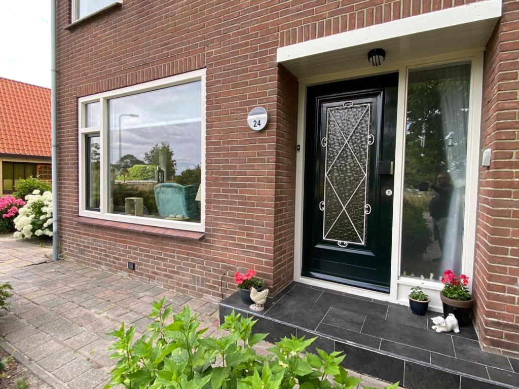 Huis Bij Het Water Met Sloepje Jutrijp Exteriér fotografie